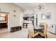 Inviting dining area with woven chairs open to the kitchen and modern bathroom at 83 E Agate Ave # 207, Las Vegas, NV 89123