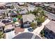 The home's location near green spaces, complemented by a pool and well-kept landscaping, is showcased in this aerial at 9008 Sawhill Pond St, Las Vegas, NV 89131