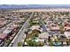 Real estate aerial view features a well-planned residential area, complete with mature trees and attractive landscaping at 9008 Sawhill Pond St, Las Vegas, NV 89131