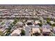 Expansive aerial view of a residential community featuring neatly arranged homes and well-maintained streets at 9008 Sawhill Pond St, Las Vegas, NV 89131