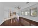 Bright open concept area with seamless hardwood and tile flooring transitions and abundant light at 9008 Sawhill Pond St, Las Vegas, NV 89131