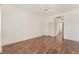 Large bedroom with wood-look floors and a ceiling fan at 9025 Loggers Mill Ave, Las Vegas, NV 89143