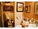 Bathroom showcasing warm earth tones, decorative towels, stylish accessories, and well-organized spaces at 9355 W Viking Rd, Las Vegas, NV 89147