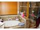 Bathroom features a jacuzzi style tub and glass shower at 9355 W Viking Rd, Las Vegas, NV 89147
