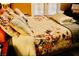 Comfortable bedroom featuring a floral comforter and decorative pillows, perfect for relaxing in style at 9355 W Viking Rd, Las Vegas, NV 89147
