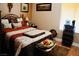 Well-decorated bedroom with a bed, side tables and lamps at 9355 W Viking Rd, Las Vegas, NV 89147