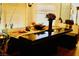Dining room with decorative table setting, wooden bench and a view at 9355 W Viking Rd, Las Vegas, NV 89147