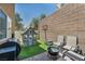 Backyard area featuring grill, playhouse, seating and basketball hoop, making it perfect for Gathering fun at 9431 Mad Dog St, Las Vegas, NV 89178