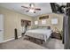 Bedroom boasts natural light, a ceiling fan, and a spacious closet at 9431 Mad Dog St, Las Vegas, NV 89178