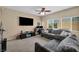 Living room featuring comfortable couches and lots of light at 9431 Mad Dog St, Las Vegas, NV 89178