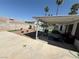Spacious backyard with covered patio, pool view, and desert landscaping ideal for entertaining and relaxation at , Las Vegas, NV 89110