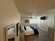 This bedroom features hardwood floors, ample natural light, and a ceiling fan at , Las Vegas, NV 89110
