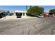 Quaint single-story home featuring a white exterior, covered entryway, and well-kept yard at , Las Vegas, NV 89110