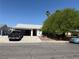 Charming single-story home with a well-maintained front yard and mature trees at , Las Vegas, NV 89110