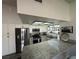 Updated kitchen with granite counters, stainless steel appliances, and white cabinetry, perfect for modern living at , Las Vegas, NV 89110