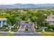 Aerial view of the luxury community with mountain views and lush landscaping at 10156 Kearney Hill Pl, Las Vegas, NV 89144