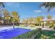 Community tennis and basketball courts with a shaded seating area at 10156 Kearney Hill Pl, Las Vegas, NV 89144