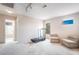 Bright bonus room featuring neutral carpet, natural light, and comfortable seating at 1742 Ashburn Dr, North Las Vegas, NV 89032