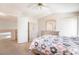 Bright bedroom with closet and dresser space and a comfortable bed with patterned bedding at 1742 Ashburn Dr, North Las Vegas, NV 89032