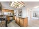 Kitchen with granite countertops, stainless steel appliances, and an island with seating at 1742 Ashburn Dr, North Las Vegas, NV 89032