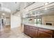 Open kitchen layout with granite countertops, breakfast bar and seamless transition to the living spaces at 1929 Stonington Pl, Las Vegas, NV 89108