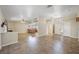 Spacious living area with tile flooring and fireplace, creating a warm and inviting atmosphere at 1929 Stonington Pl, Las Vegas, NV 89108