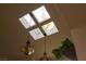 Vaulted ceiling featuring four skylights and unique pendant lighting at 2108 Inverness Dr, Henderson, NV 89074
