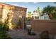 A private courtyard offers shaded seating and desert-style landscaping at 2108 Inverness Dr, Henderson, NV 89074