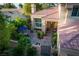 Attractive front yard with brick patio, desert landscaping, and private courtyard at 2108 Inverness Dr, Henderson, NV 89074