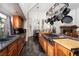Spacious kitchen with stainless steel appliances, a pot rack, and a view of the backyard at 2108 Inverness Dr, Henderson, NV 89074