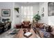 Inviting living room featuring unique decor, comfortable seating, and plenty of natural light at 2108 Inverness Dr, Henderson, NV 89074