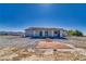 Large backyard featuring a paved patio area and ample space for landscaping and outdoor activities at 2650 Underbrush Ave, Pahrump, NV 89048