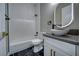 Well lit bathroom with a soaking tub, granite countertop and modern vanity at 2650 Underbrush Ave, Pahrump, NV 89048