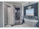 Spa-like bathroom with a freestanding tub, walk-in shower with custom tile, and modern fixtures at 2650 Underbrush Ave, Pahrump, NV 89048