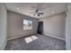 Bedroom with a window and a door leaning against the wall at 2650 Underbrush Ave, Pahrump, NV 89048