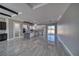 Spacious kitchen features stainless steel appliances, gray countertops and white cabinetry at 2650 Underbrush Ave, Pahrump, NV 89048