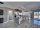 Gourmet kitchen features stainless steel appliances, a pantry, and gray countertops at 2650 Underbrush Ave, Pahrump, NV 89048