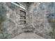 Elegant shower with dual shower heads, built-in niche, mosaic tile flooring and corner seat at 2650 Underbrush Ave, Pahrump, NV 89048