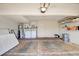 Spacious garage with washer, dryer, water heater and room for parking vehicles at 2696 Matogroso Ln, Las Vegas, NV 89121