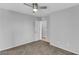 Bedroom featuring neutral paint, carpet floors, a ceiling fan, and doorway at 2832 Aragon Terrace Way, Henderson, NV 89044