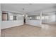 Bright dining room with tile flooring and an elegant chandelier, showing a seamless transition to other living spaces at 2832 Aragon Terrace Way, Henderson, NV 89044