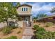 Attractive home featuring a brick walkway, desert landscaping, and covered entryway at 2832 Aragon Terrace Way, Henderson, NV 89044