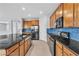 Modern kitchen with granite countertops and stainless appliances at 2832 Aragon Terrace Way, Henderson, NV 89044