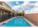 Sparkling pool and spa in a well-maintained backyard with lush landscaping at 2832 Aragon Terrace Way, Henderson, NV 89044