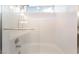 Clean bathroom featuring a white tiled shower and bathtub with glass door at 2874 Avanti Ln, Henderson, NV 89074