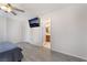 Bedroom showcases light walls and plank floors, with an ensuite bathroom and closet at 2874 Avanti Ln, Henderson, NV 89074