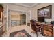 Home office featuring French doors, and traditional-style desk and chair at 3042 Hammerwood Dr, Las Vegas, NV 89135