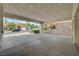 Spacious carport offering covered parking with views of the street and surrounding neighborhood at 3192 Tullio Way, Henderson, NV 89052