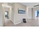 Bright hallway featuring hard surface flooring and neutral paint at 3192 Tullio Way, Henderson, NV 89052