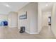 Hallway with gray toned flooring and neutral painted walls at 3192 Tullio Way, Henderson, NV 89052
